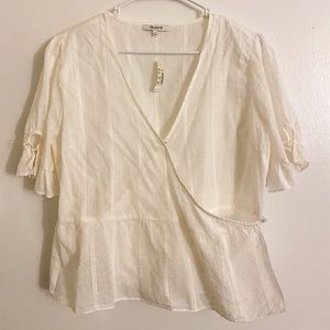 Madewell cream colored wrap peplum shirt.